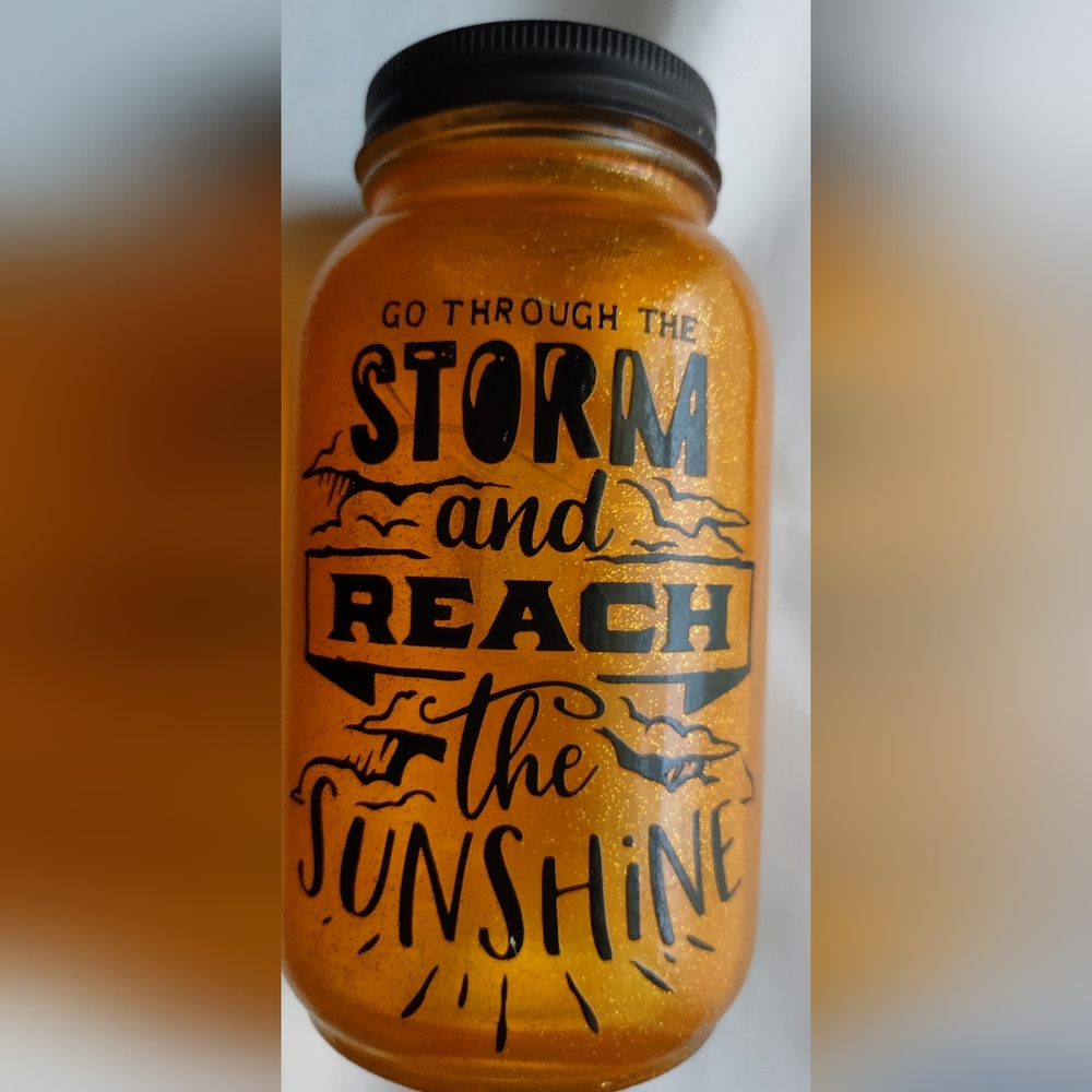 Glass light up push button to jar with inspiration message.